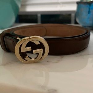 Brown Gucci with gold interlocking G buckle